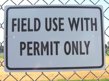 Field Use With Permit Only Sign